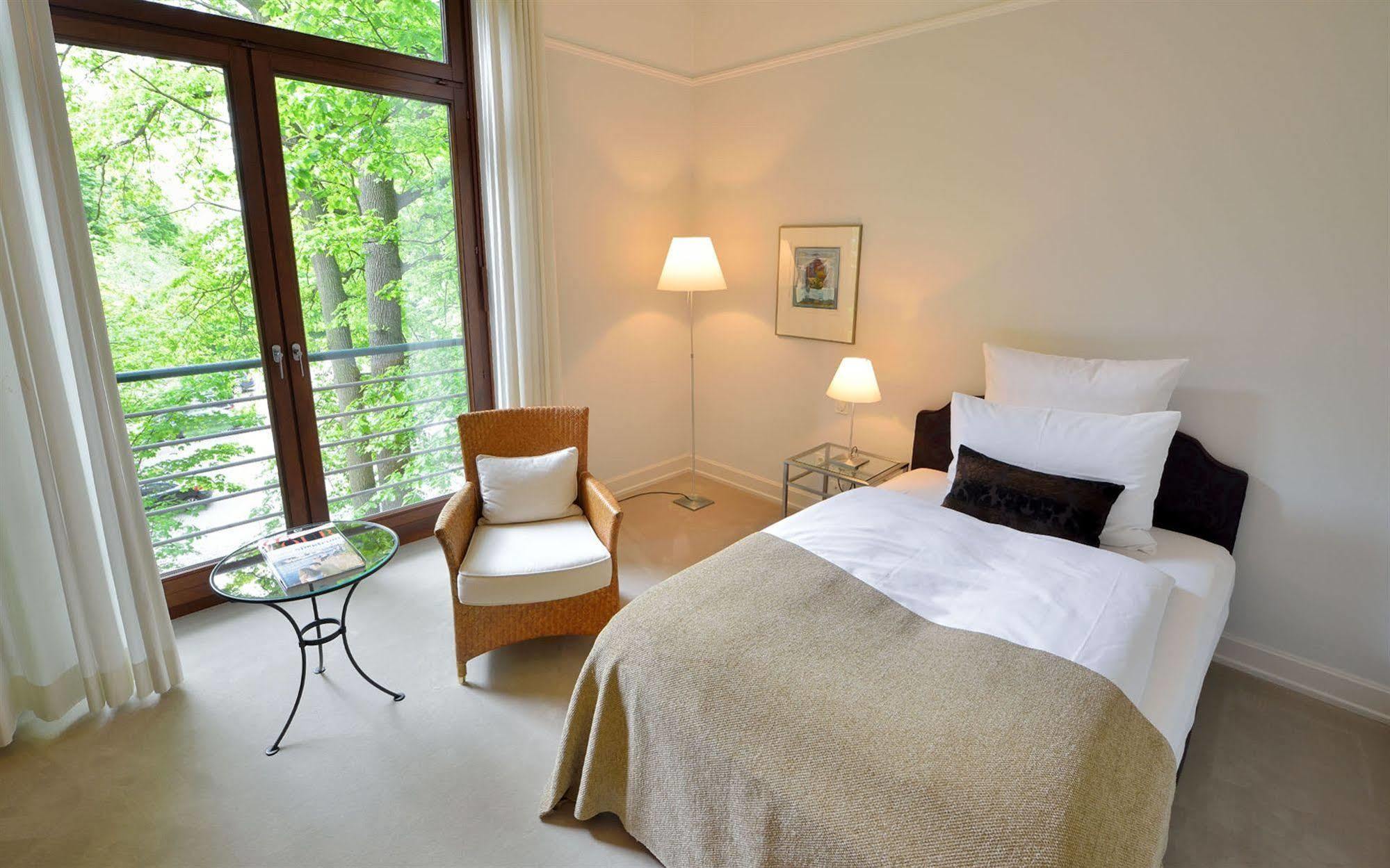 プリバート ホテル リンデナー ハンブルグ ハンブルク エクステリア 写真 A bedroom at the hotel